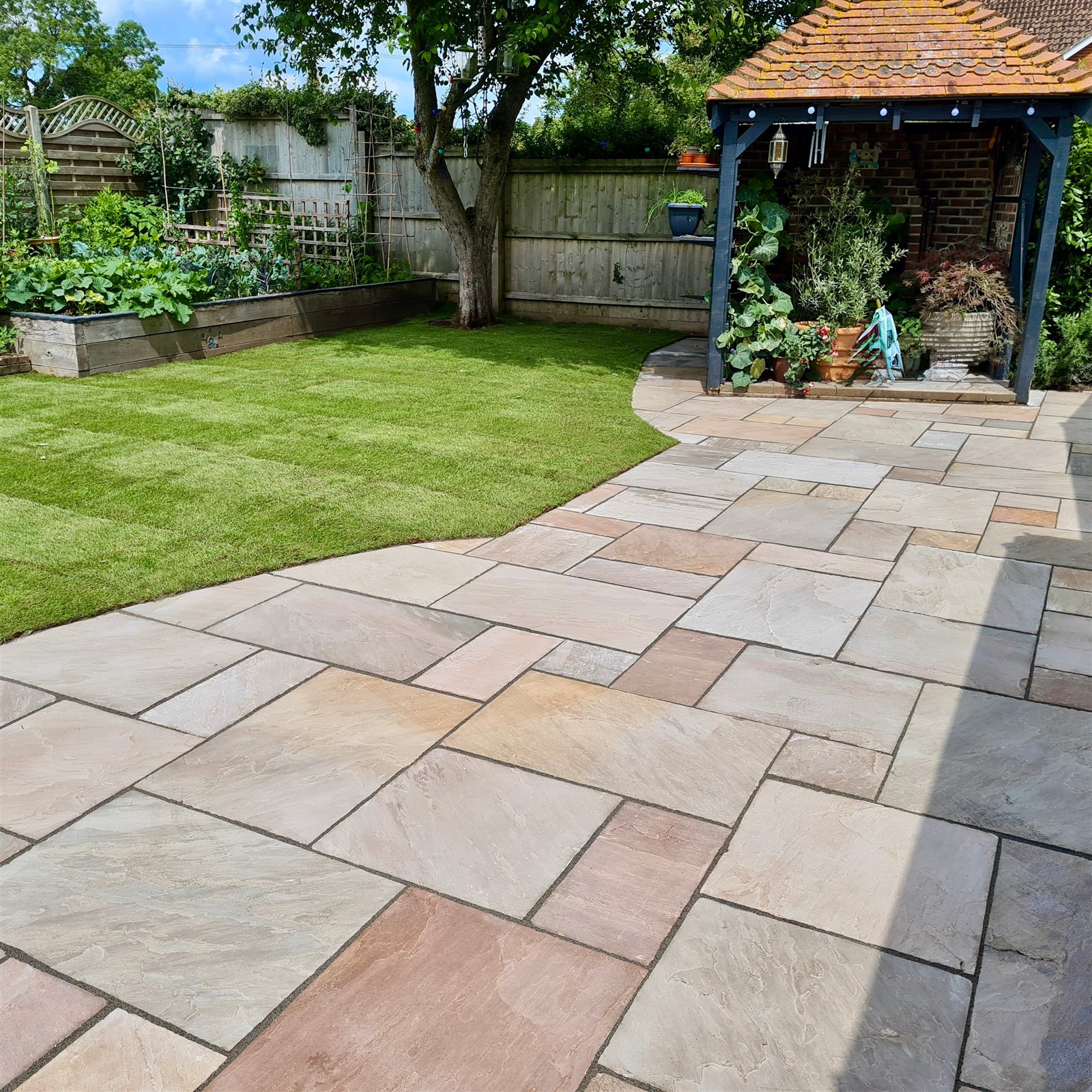 Natural sandstone finish installed by Harcourt Exteriors