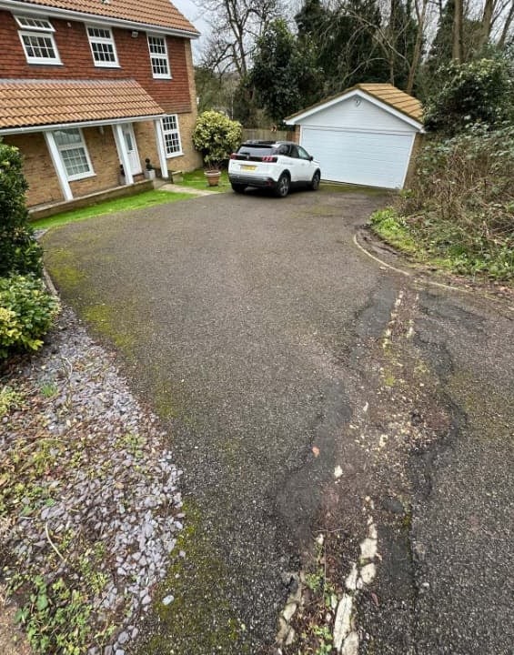 Driveway before the Harcourt Exteriors tarmac transformation